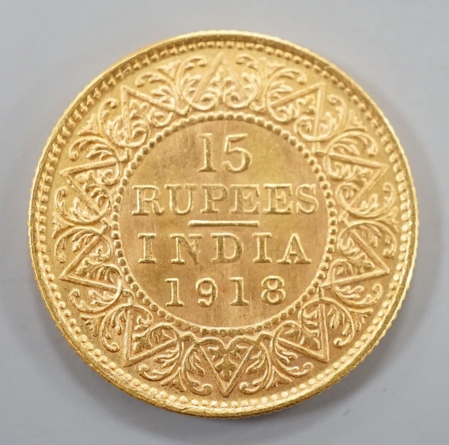 British India, George VI 15 gold rupees 1918, area of edge worn otherwise VF